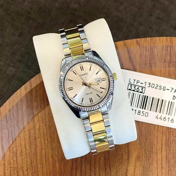 Casio Femme LTP-1302SG-7A Élégante Cadran Argenté Bracelet Bicolore LTP-1302SG-7A https://aiguilledeluxe.com original Algerie DZ