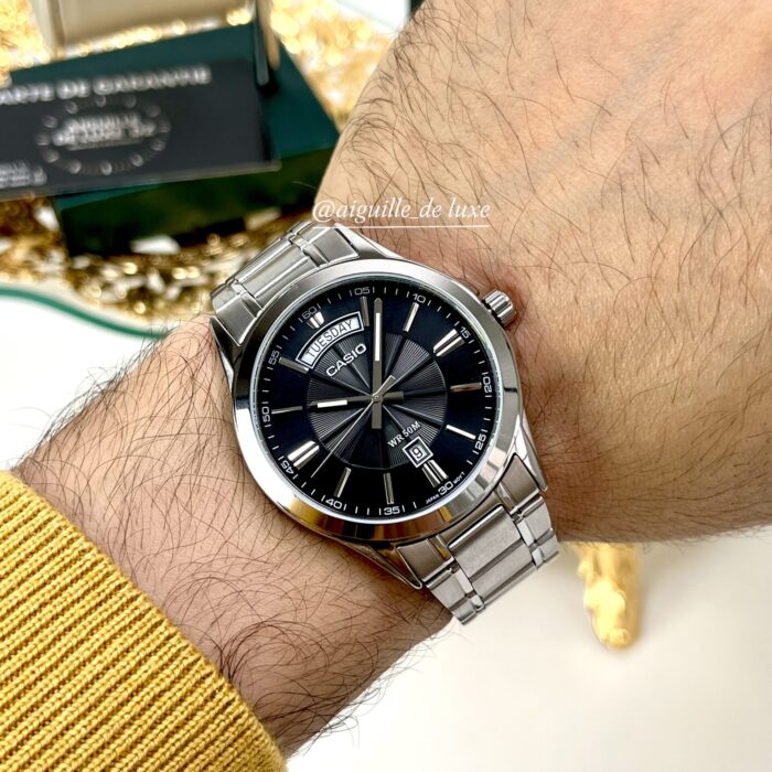 Casio Homme MTP-1381D-1A Montre Analogique Acier Inoxydable Cadran Noir Date/Jour (Copie) MTP-1381D-1A-1 https://aiguilledeluxe.com original Algerie DZ