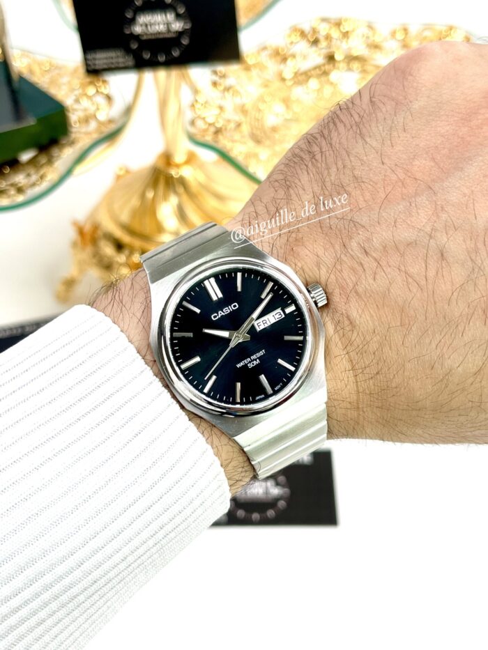Casio Homme MTP-E735D-7AV  Acier Inoxydable  Noir  Affichage Jour/Date MTP-E735D-1A https://aiguilledeluxe.com original Algerie DZ