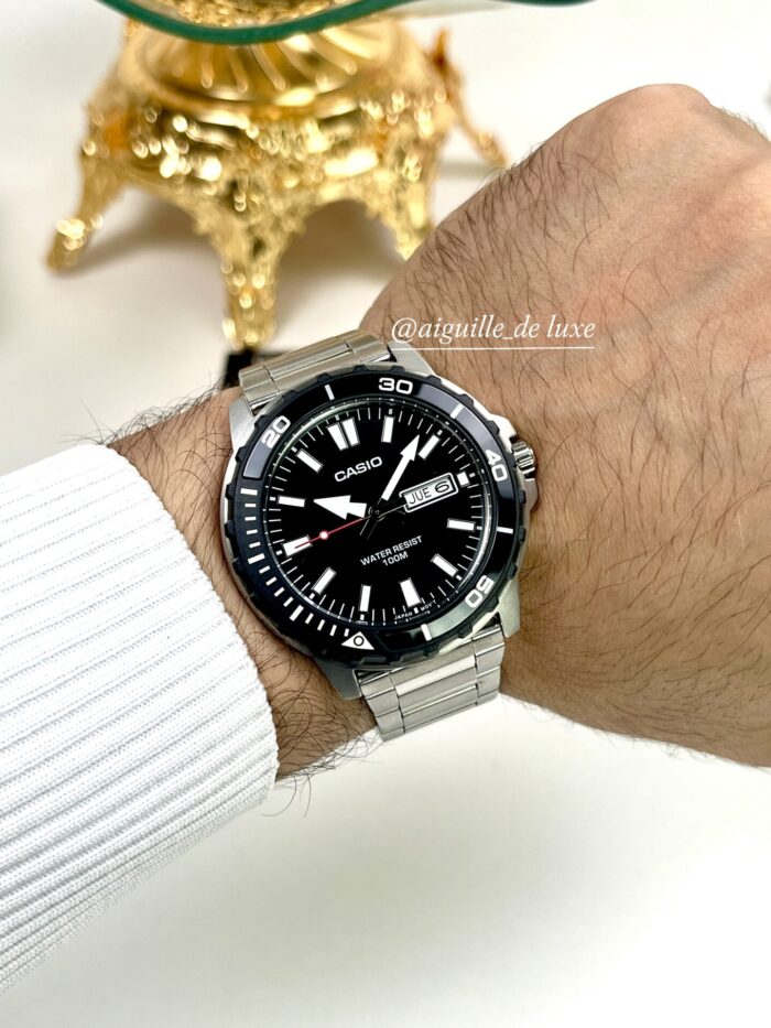 Casio Homme MTD‑125D‑1A1 Montre Plongée Quartz Acier Robuste Cadran Noir Résistance 100 m MTD-125D-1A1 https://aiguilledeluxe.com original Algerie DZ