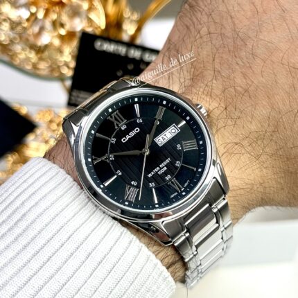 Casio Homme MTP‑1384D‑1A Classe Acier Inoxydable Cadran Noir Jour/Date MTP-1384D-1A https://aiguilledeluxe.com original Algerie DZ