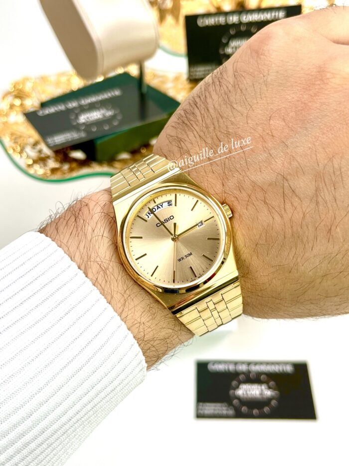 Casio Unisexe MTP‑B146G‑9A Quartz Acier Doré Charme Cadran Champagne Jour/Date MTP-B146D-2A-1 https://aiguilledeluxe.com original Algerie DZ