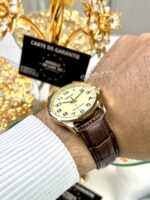 Casio Homme MTP-V001GL-9B Montre Élégante Dorée Cuir Brun MTP-V001GL-9B https://aiguilledeluxe.com original Algerie DZ